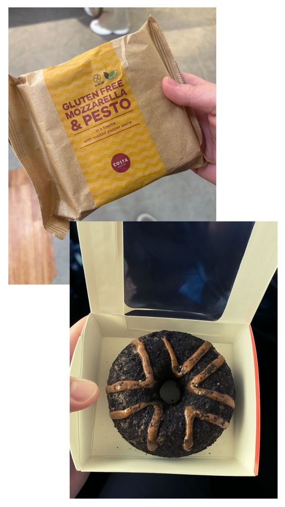 Top Left - Gluten Free Mozzarella & Pesto Toastie from Costa Coffee still in its brown paper bag style packaging, is held with one hand and the other taking the photo. Bottom Right - Chocolate doughnut with wide v shaped chocolate ganache decorations is topped with chocolate cake crumb. The doughnut is sat inside its white box that has a peekaboo window on the lid and is being held open.